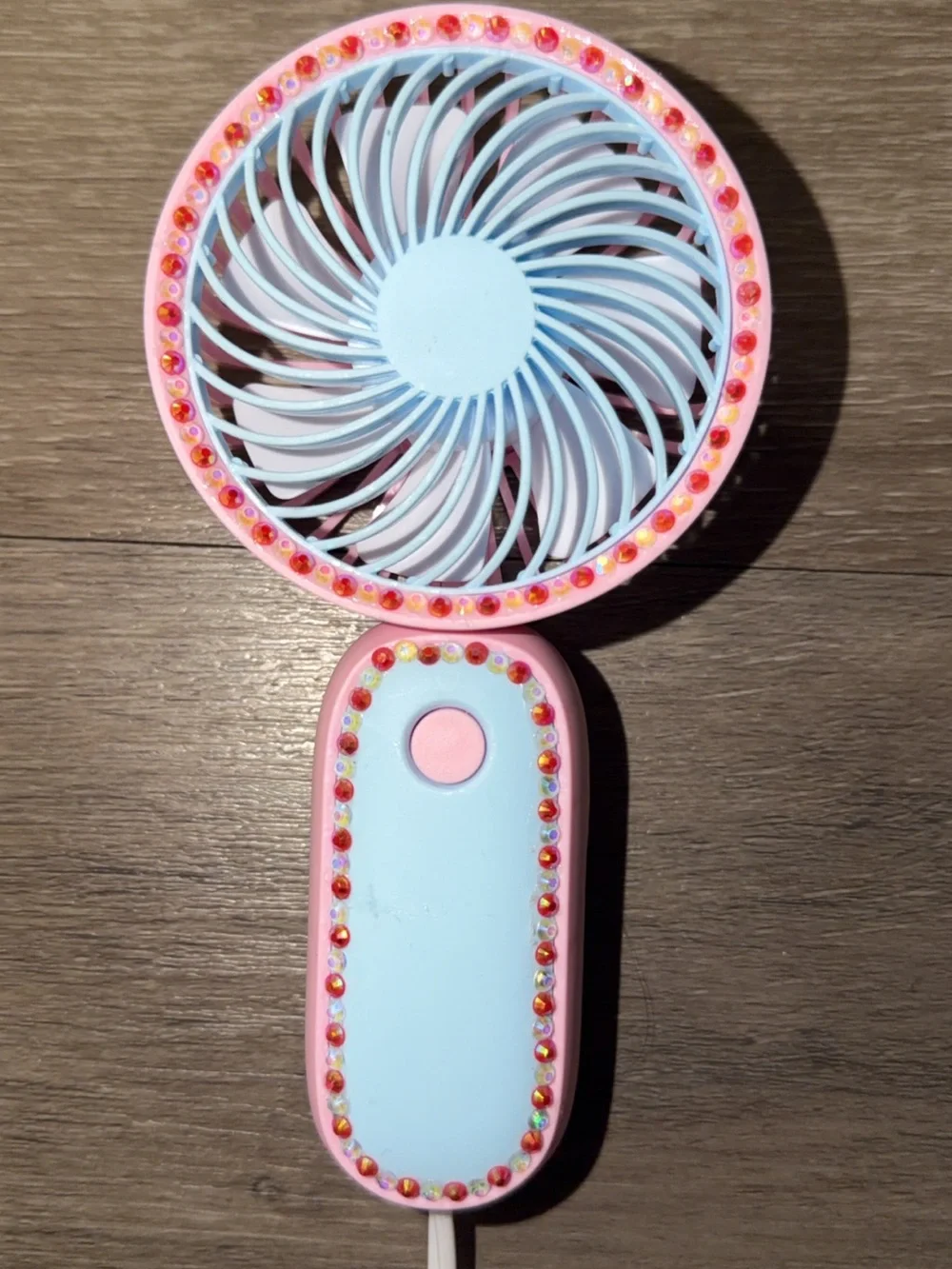 pink & blue handheld fan with red & white rhinestones